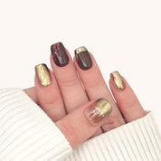 Unghie press on rosso glitterato e oro