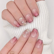 Unghie press on french occhio di gatto rosa con fiori oro