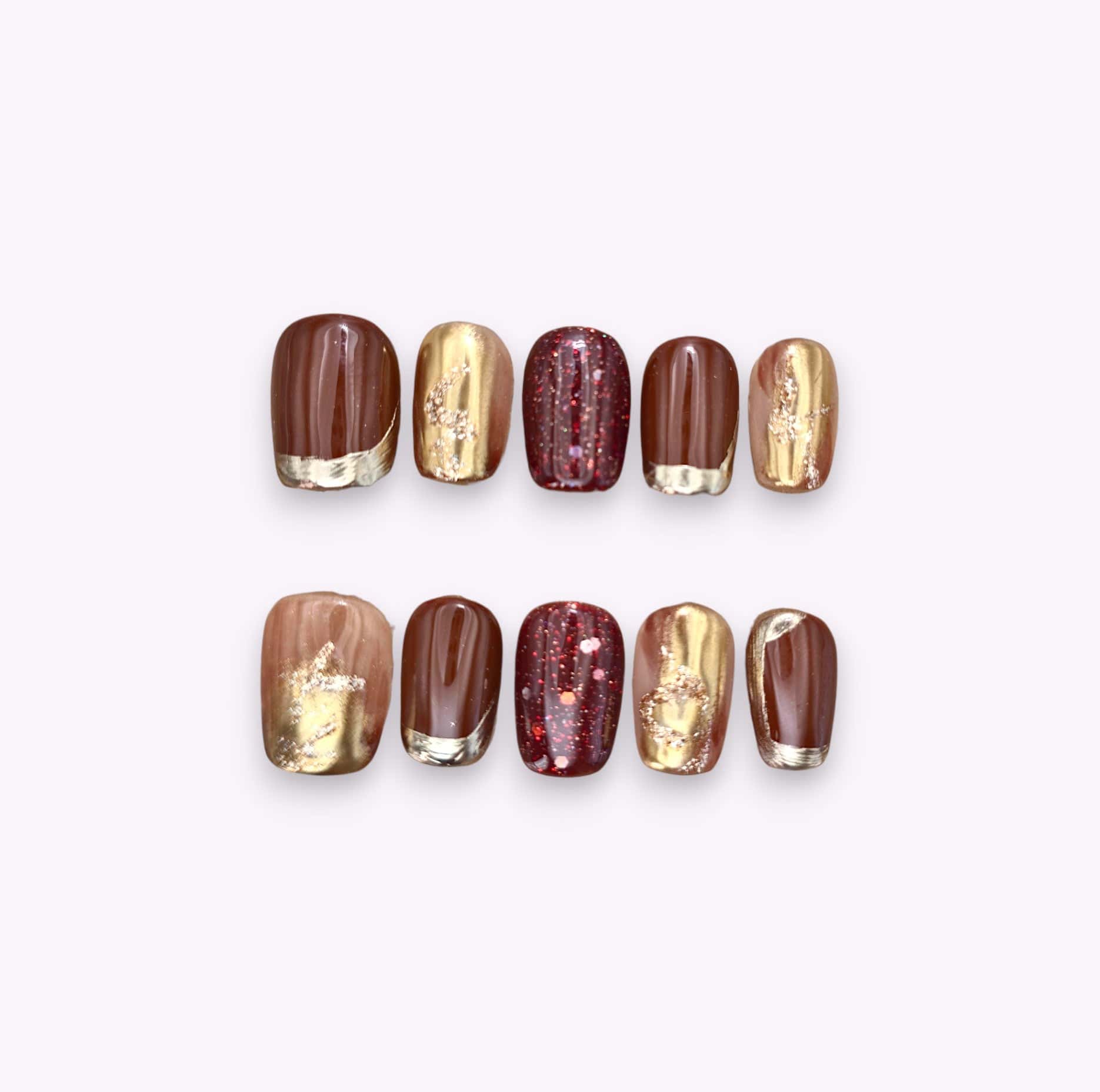 Unghie press on rosso glitterato, oro glitter